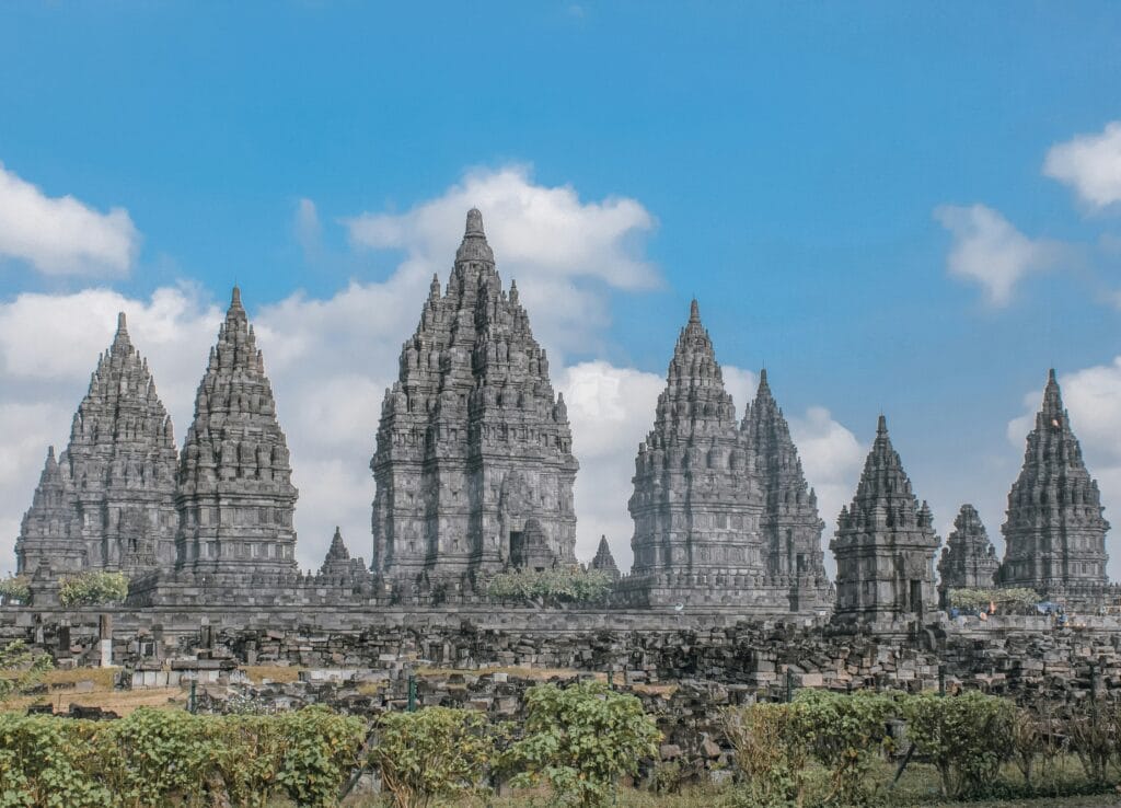 The ancient Buddhist temple of Borobudur and its bell-shaped stone stupas near Yogyakarta, Indonesia.
